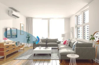 A modern, minimalist living room with a heat pump unit subtly integrated into the design. The room should have large windows, comfortable furniture, and a sense of warmth and efficiency. Focus on clean lines and a bright, airy atmosphere. Subtle visual cues indicating airflow (e.g., faint lines suggesting air movement) would be beneficial.